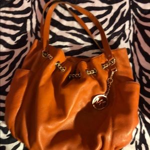 Orange leather Michael Kors hobo bag